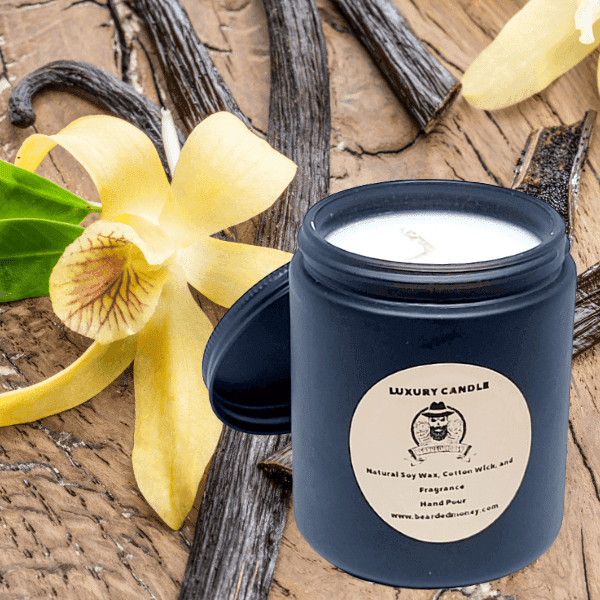 Revenge (Sandalwood Vanilla) soy wax candle in a Black metallic glass jar with a lid. This candle has a soft vanilla mixes with an earthy sandalwood and musk for a powdery Earthy aroma