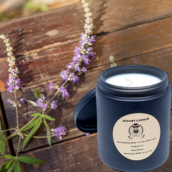 Lavender Woody soy wax candle in a black metallic glass jar with a lid. The candle has&nbsp;a scent of soft lavender woody that is brightened by lemon and sweetened by a hint of honey.