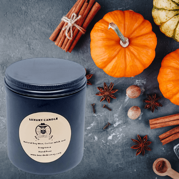Pumpkin Spice soy wax candle in  black metallic glass jar with a lid. The candle has a velvety pumpkin pie with almond extract, lemon peel, butter cream, spicy nutmeg, cinnamon, clove and maple.